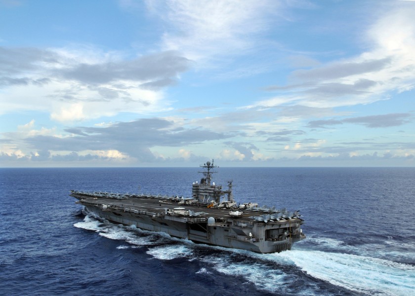US Navy 080927-N-7981E-141 The aircraft carrier USS Abraham Lincoln (CVN 72) is underway as evening falls during a transit of the Pacific Ocean