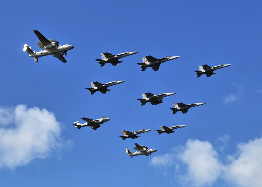US Navy 080929-N-7981E-605 Aircraft assigned to Carrier Air Wing (CVW) 2 fly over the aircraft carrier USS Abraham Lincoln (CVN 72) in formation during an air power demonstration
