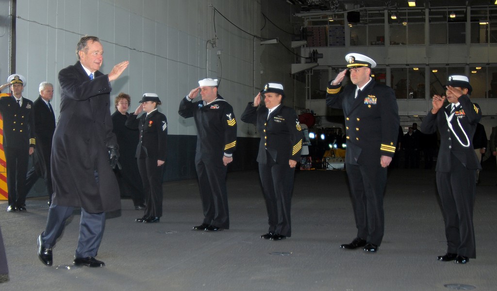 US Navy 090108-N-5658B-033 Former president George H.W. Bush salutes the side boys as he is piped aboard the aircraft carrier George H.W. Bush (CVN 77) at Naval Station Norfolk