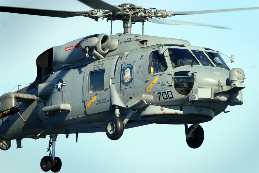 US Navy 090203-N-0774H-101 Pilots land a SH-60B Sea Hawk aboard SS Abraham Lincoln (CVN 72)