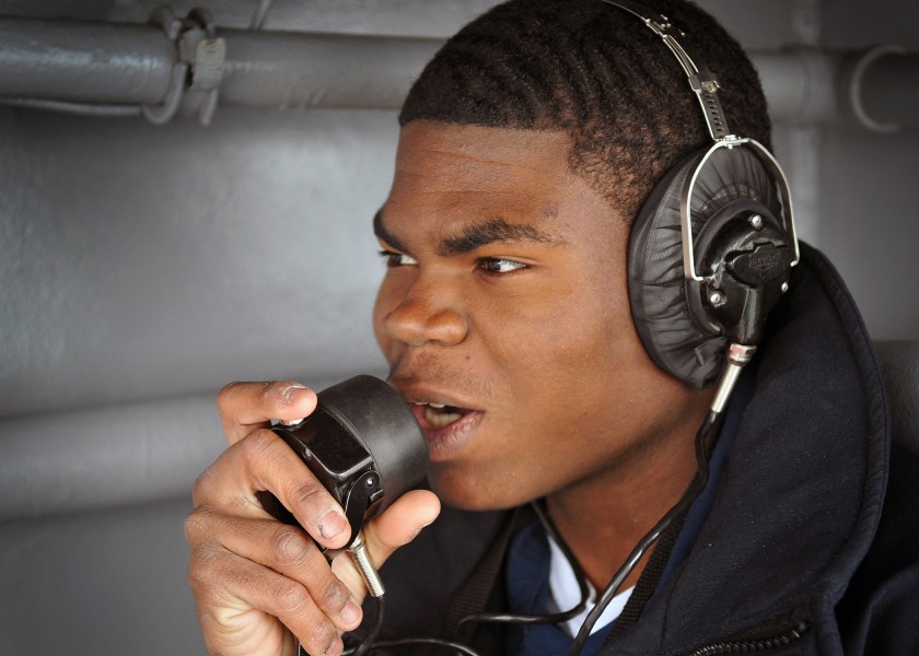 US Navy 090410-N-0774H-012 Operations Specialist Seaman Chris Danley, from Douglasville, Ga., makes a call to the bridge before a sighting team drill aboard the aircraft carrier USS Abraham Lincoln (CVN 72)