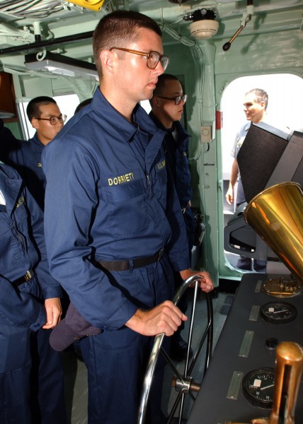 US Navy 090728-N-5528G-023 A Plebe takes the helm of Yard Patrol (YP) Craft 696 in the Chesapeake Bay