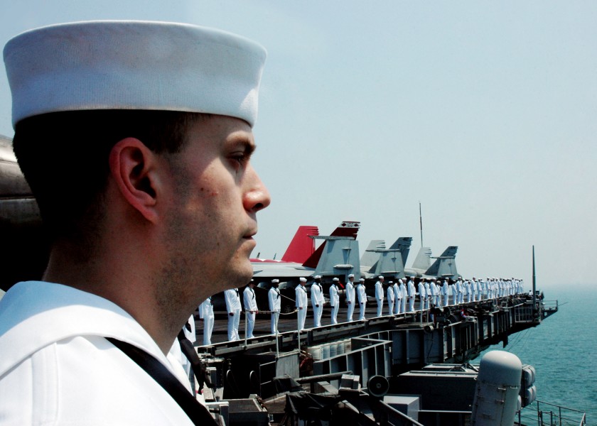 US Navy 090806-N-7191M-043 Sailors man the rails aboard the aircraft carrier USS George Washington (CVN 73) while transiting out of Singapore