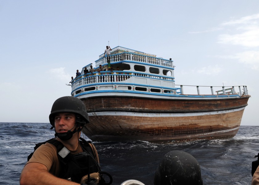 US Navy 090830-N-6814F-016 Lt. j.g. Andrew Mechling, visit, board, search, and seizure (VBSS) lead boarding officer, speaks with other VBSS team members during an approach operation
