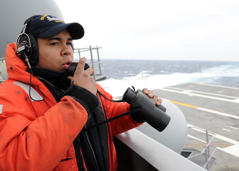 US Navy 100227-N-3885H-095 Seaman Kyle Tugman stands port lookout aboard USS George H.W. Bush (CVN 77)