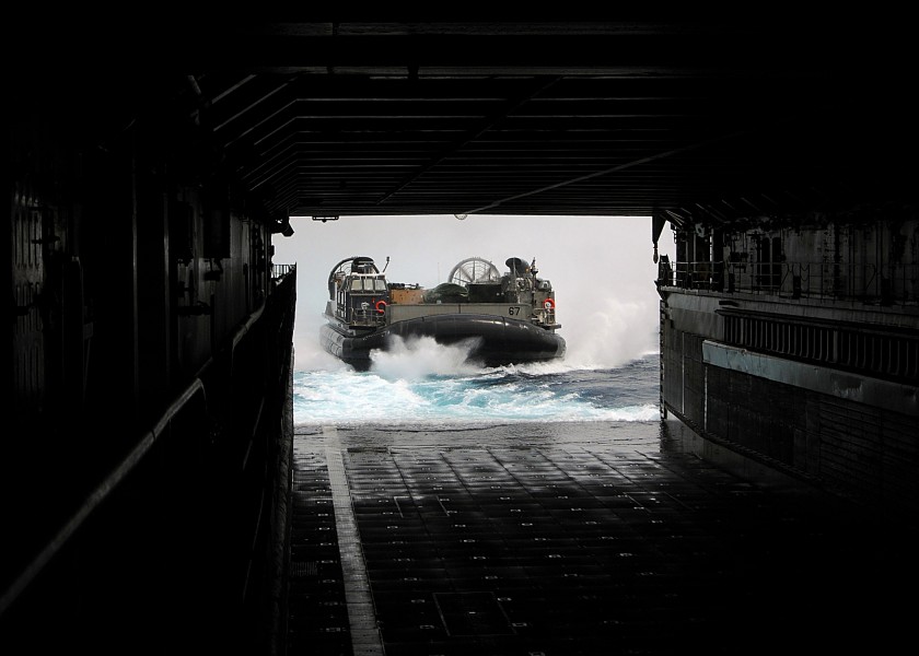 US Navy 100305-N-1082Z-009 Landing Craft Air Cushion (LCAC) 67, assigned to Assault Craft Unit (ACU) 4, approaches the well deck of the amphibious dock landing ship USS Ashland (LSD 48)