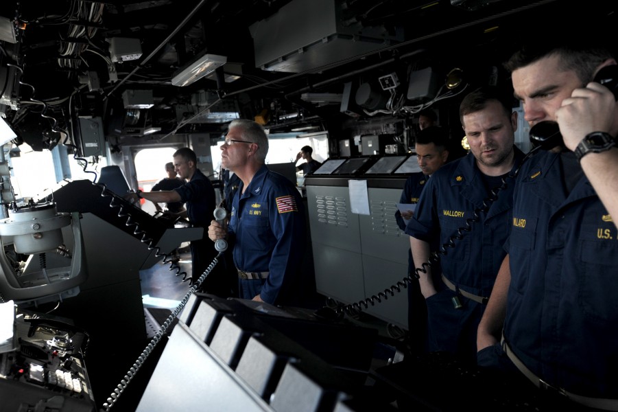 US Navy 100514-N-0553R-014 Sailors stand on the bridge of USS San Jacinto