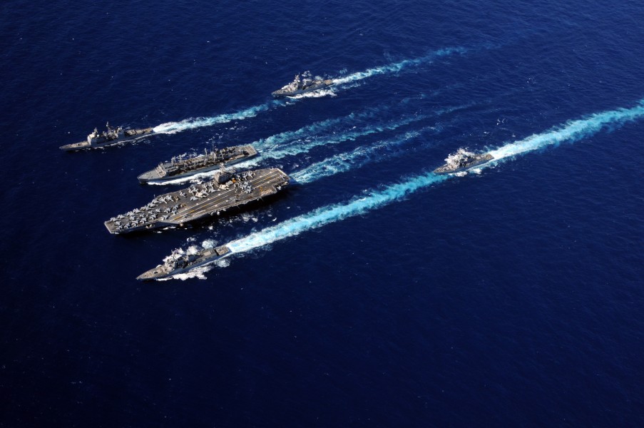 US Navy 100919-N-5226D-141 The Abraham Lincoln Carrier Strike Group ships cruise in formation during an underway replenishment with the Military Se