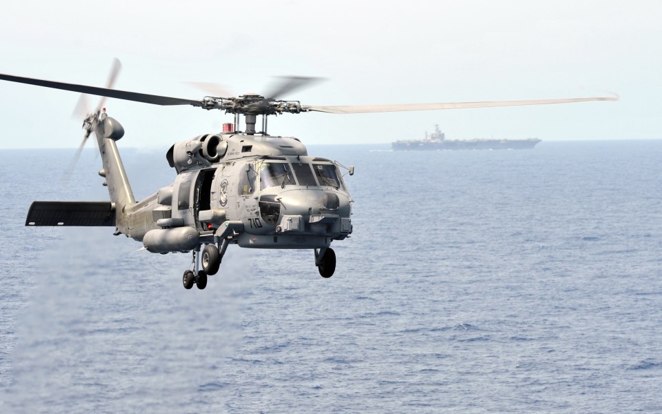 US Navy 110309-N-PM781-193 An MH-60R Sea Hawk helicopter participates in an air power demonstration