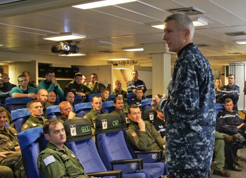 US Navy 110321-N-0000X-027 Adm. Samuel J. Locklear, III speaks with an aircrew team from the French Navy aircraft carrier Charles de Gaulle (R91)