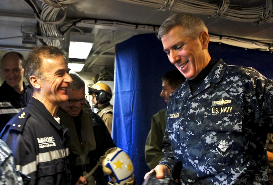 US Navy 110321-N-0000X-039 Adm. Samuel J. Locklear, III speaks with French navy Rear Adm. Philippe Coindreau aboardCharles de Gaulle (R91)