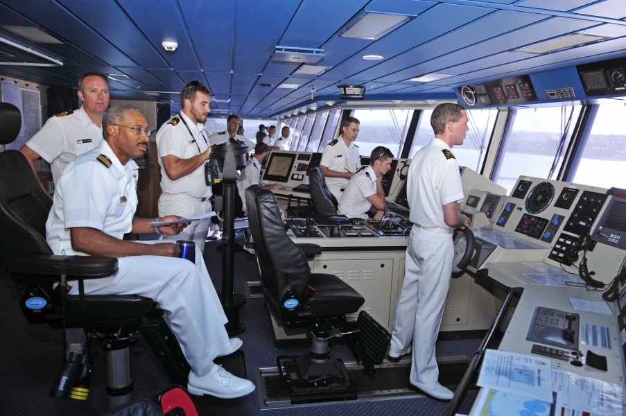 US Navy 110423-N-ZF681-011 Capt. Jesse A. Wilson commander of Pacific Partnership sits in the captain's chair aboard the New Zealand navy multirole