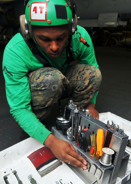 US Navy 110518-N-1004S-002 Lance Cpl. Randal Gibson performs a full toolbox inspection in the hangar bay of USS Ronald Reagan (CVN 76)