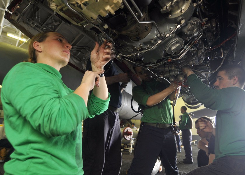 US Navy 110621-N-EE987-071 Aviation structural mechanics prepare an EA-6B Prowler for an engine swap in the hangar bay of USS Ronald Reagan (CVN 76