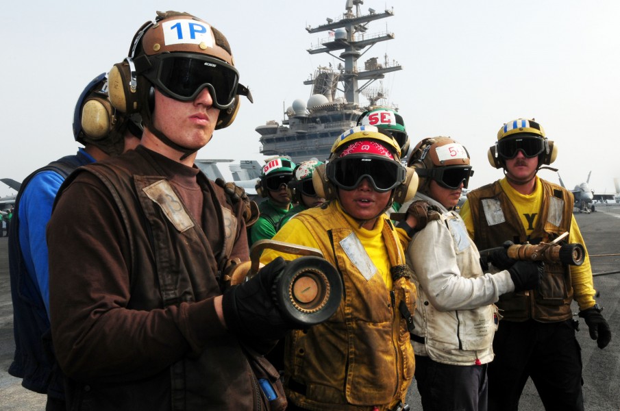 US Navy 110718-N-SB672-036 Sailors simulate fighting an aircraft fire on the flight deck of the aircraft carrier USS Ronald Reagan (CVN 76)
