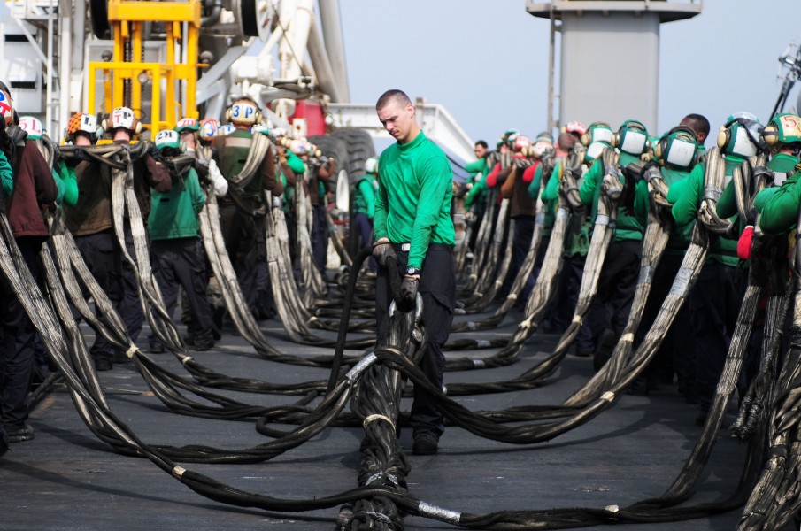 US Navy 110718-N-SB672-088 Sailors stow an aircraft barricade after flight deck drills aboard the aircraft carrier USS Ronald Reagan (CVN 76)