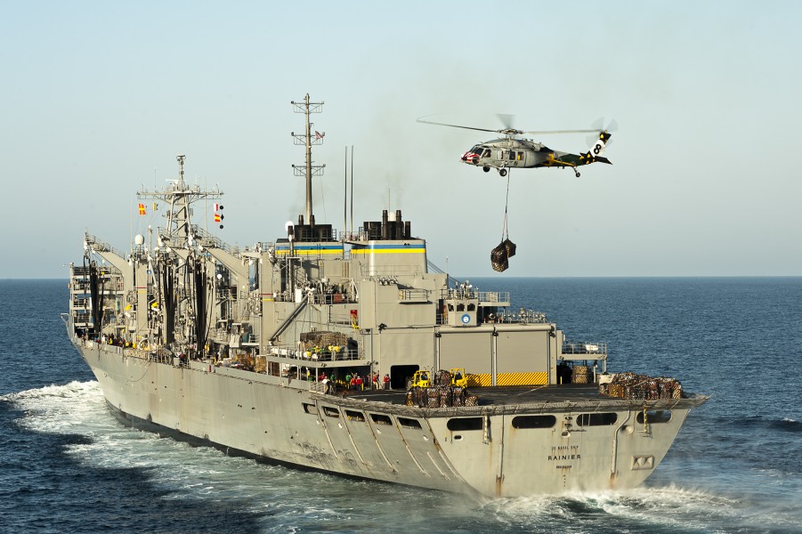US Navy 111020-N-BT887-291 An MH-60S Sea Hawk helicopter assigned to the Eightballers of Helicopter Sea Combat Squadron (HSC) 8, lifts cargo 