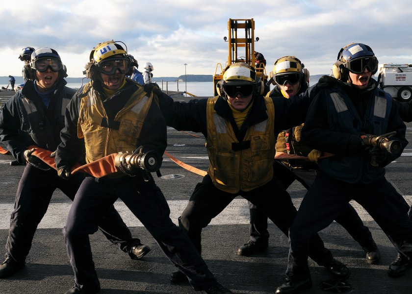 US Navy 111202-N-KQ416-356 Sailors conduct firefighting training aboard the Nimitz-class aircraft carrier USS Abraham Lincoln (CVN 72)
