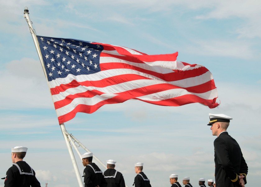 US Navy 111211-N-NB694-049 Sailors assigned to the Nimitz-class aircraft carrier USS Abraham Lincoln (CVN 72) man the rails as the ship pulls out o