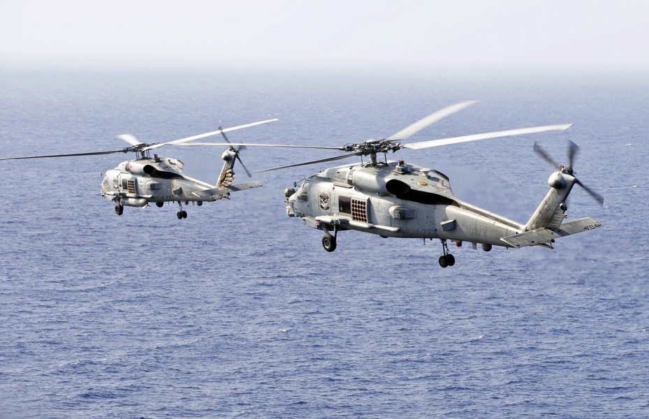 US Navy 120105-N-JN612-069 Cmdr. Brent Gaut relieves Cmdr. Kenneth Strong as commanding officer of Helicopter Maritime Strike Squadron (HSM) 77 dur