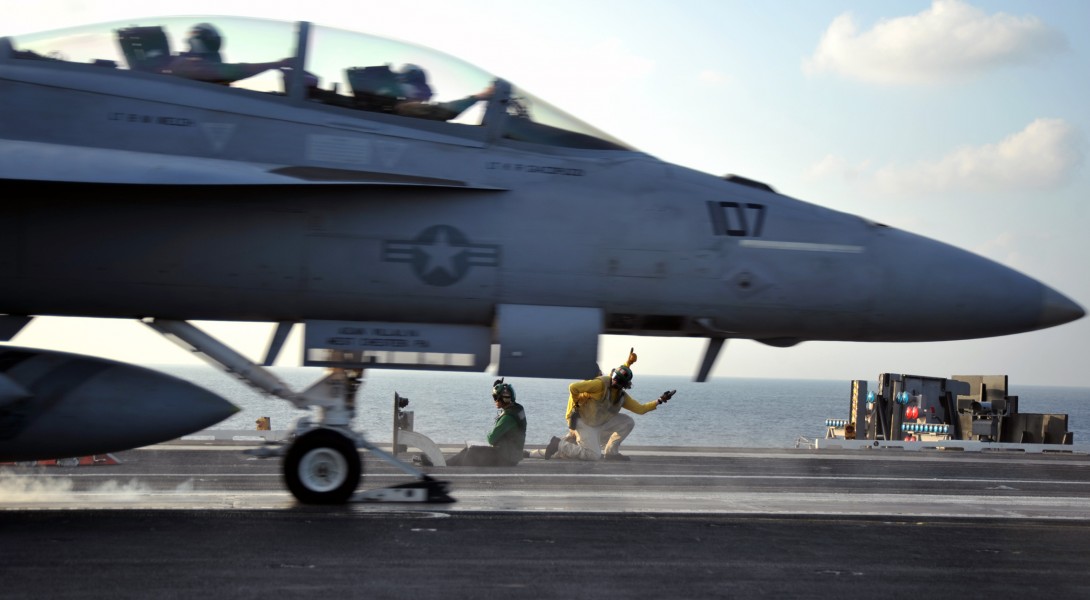 US Navy 120116-N-YB753-113 A shooter signals the launch of an F-A-18F Super Hornet assigned to the Bounty Hunters of Strike Fighter Squadron (VFA) 