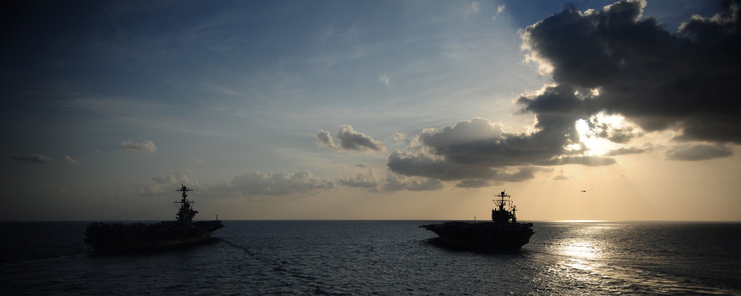 US Navy 120119-N-YL945-272 The Nimitz-class aircraft carriers USS Abraham Lincoln (CVN 72) and USS John C. Stennis (CVN 74) join for a turnover of 