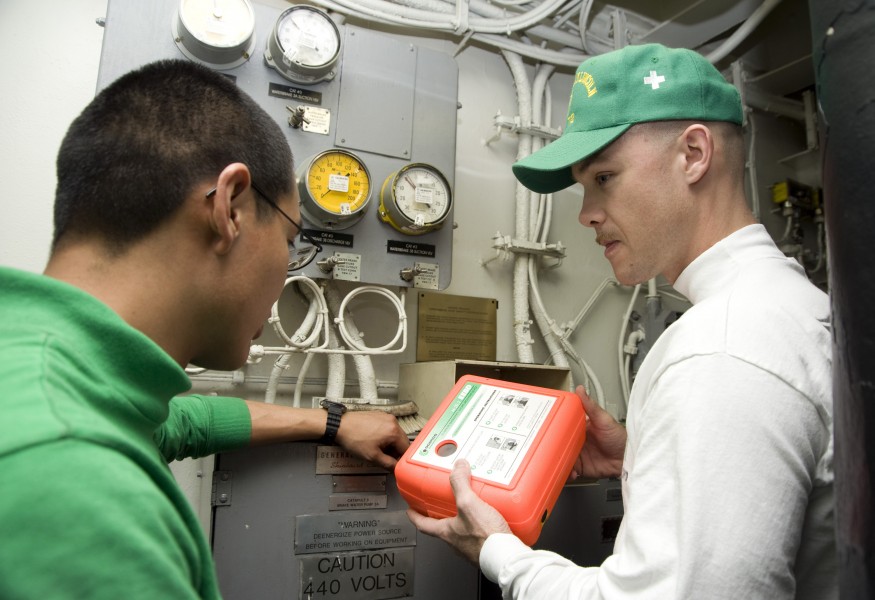 US Navy 120208-N-JN664-025 Chief Aviation Boatswain's Mate (Fuel) Richard Palmer performs a zone inspection aboard the Nimitz-class aircraft carrie