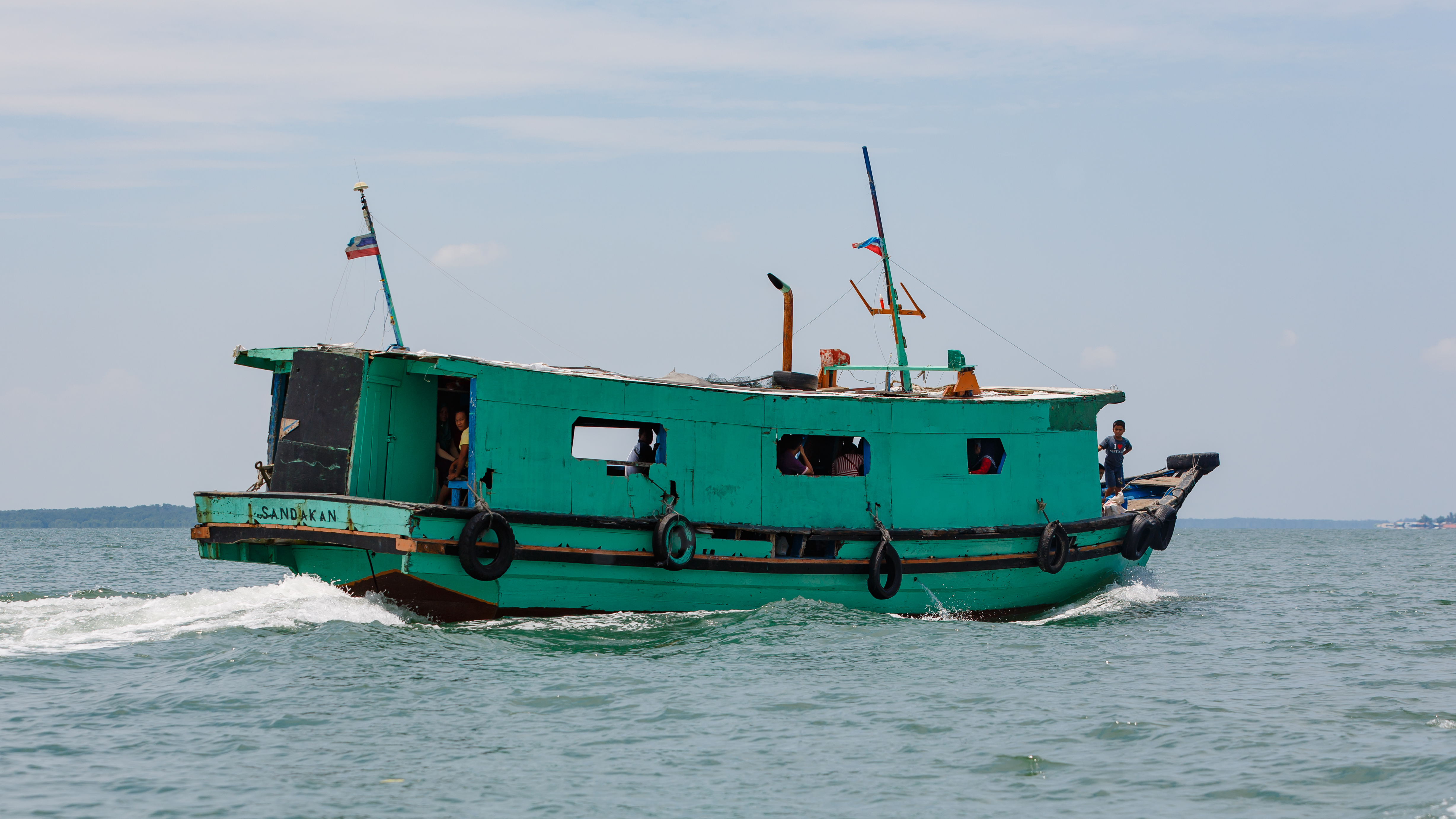 Sandakan Sabah Water-Taxi-between-Berhala-and-Buli-Sim-Sim-01