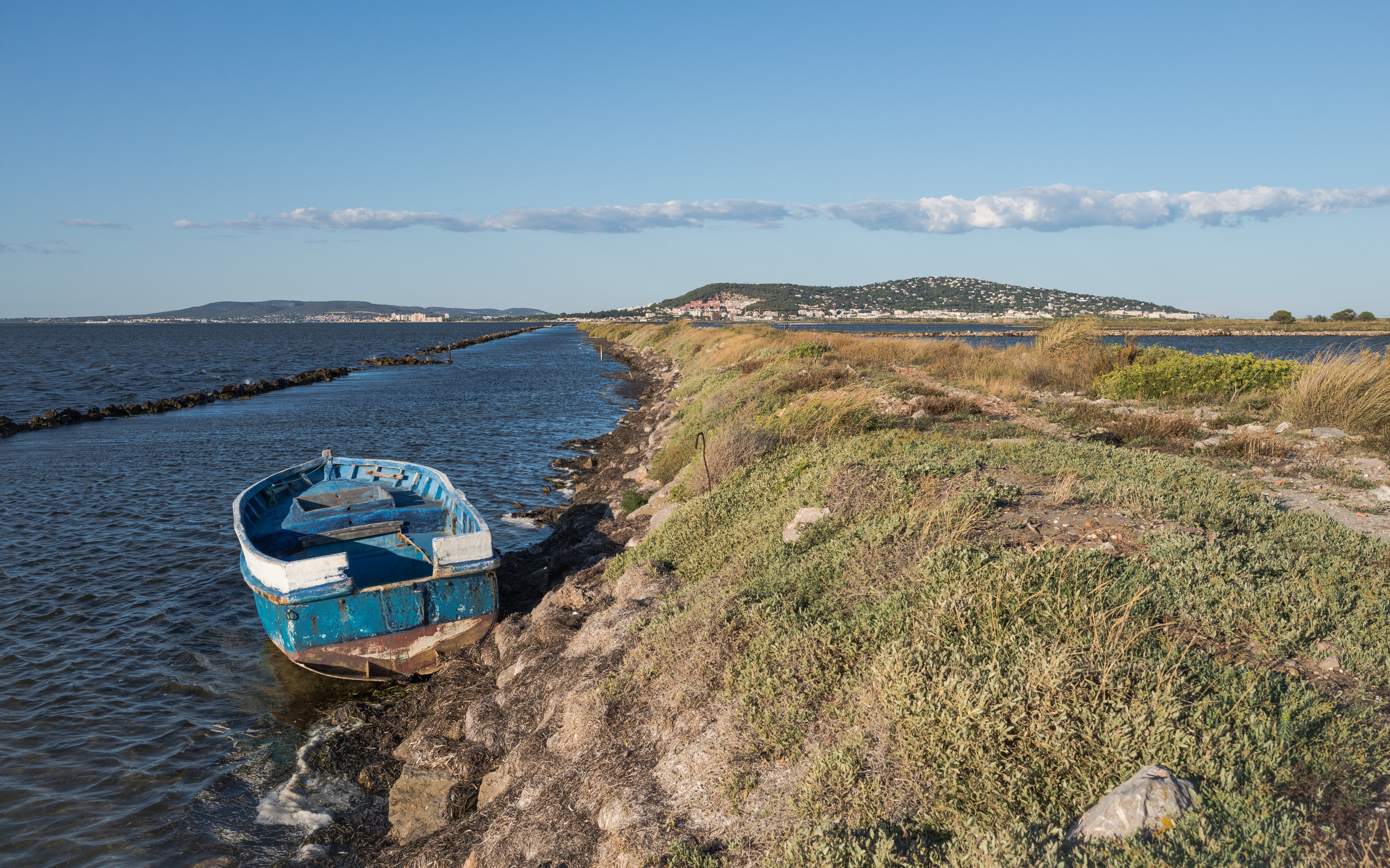 Boat and Mount Saint-Clair from Lido de Thau