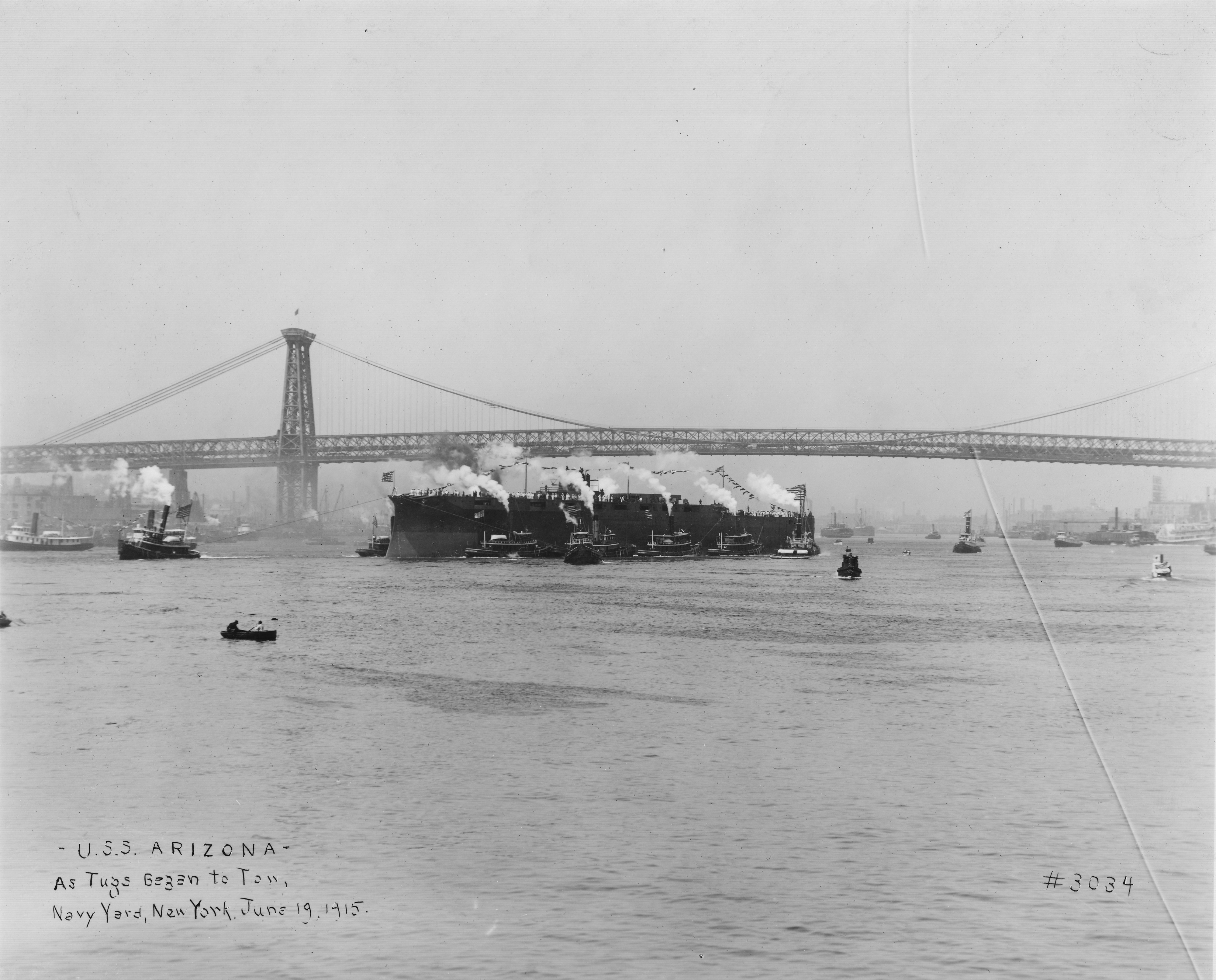 USS Arizona pushed by tugs after launch NARA 19-LC-19A-10