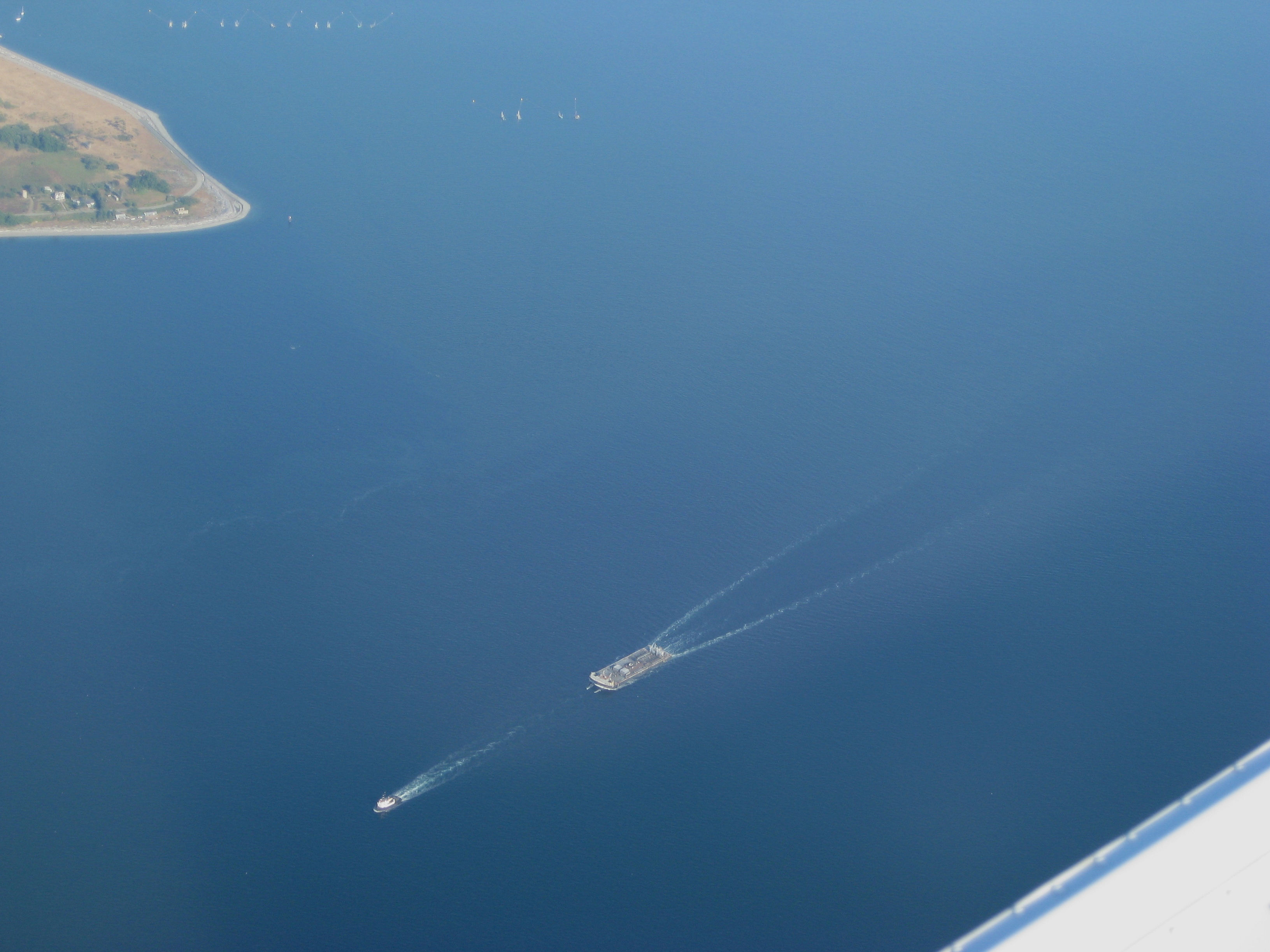 Tugboat towing a Barge off Lummi Island