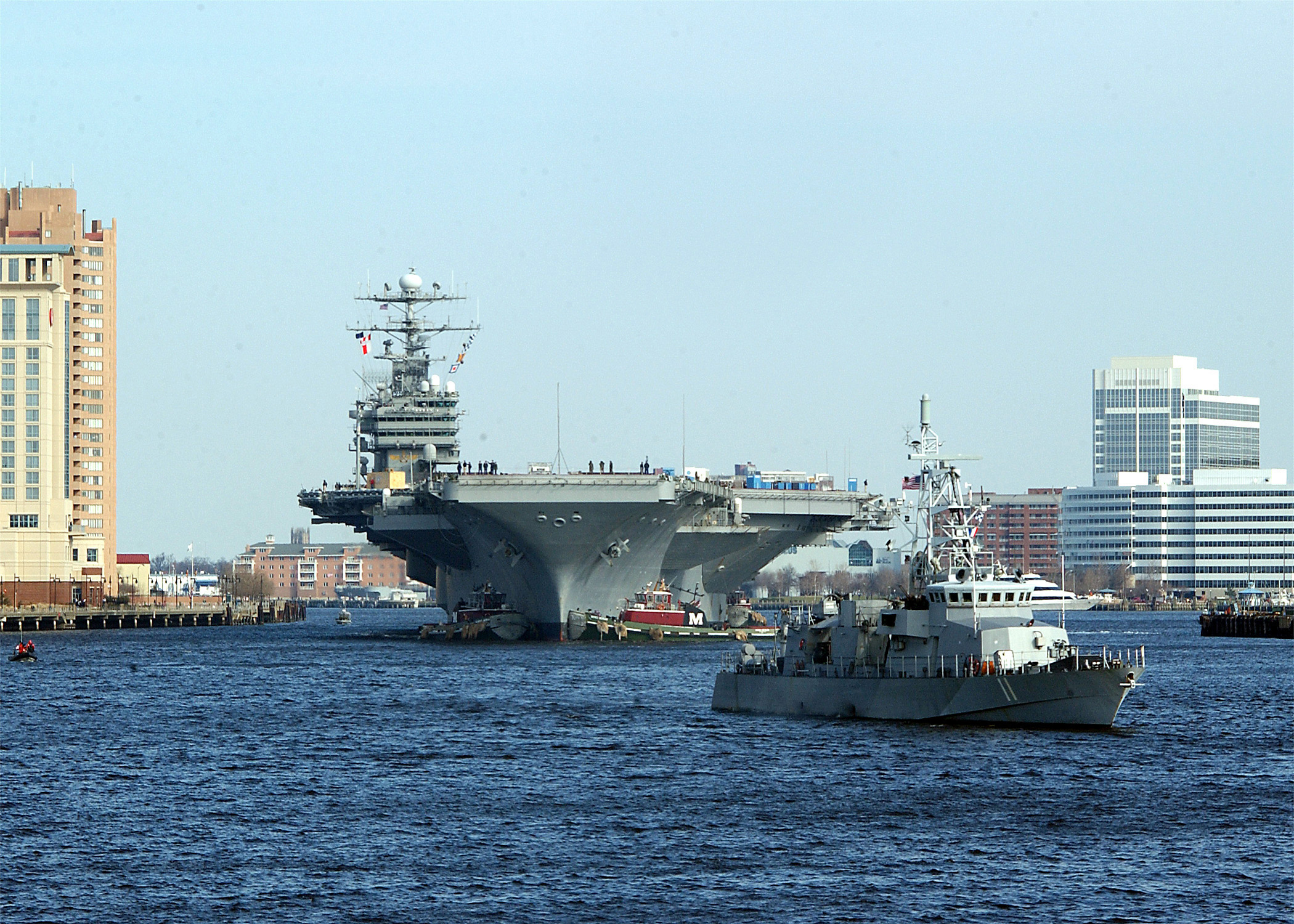 US Navy 030225-N-1743B-001 USS George Washington (CVN 73) passes by downtown Norfolk during her transit down the Elizabeth River