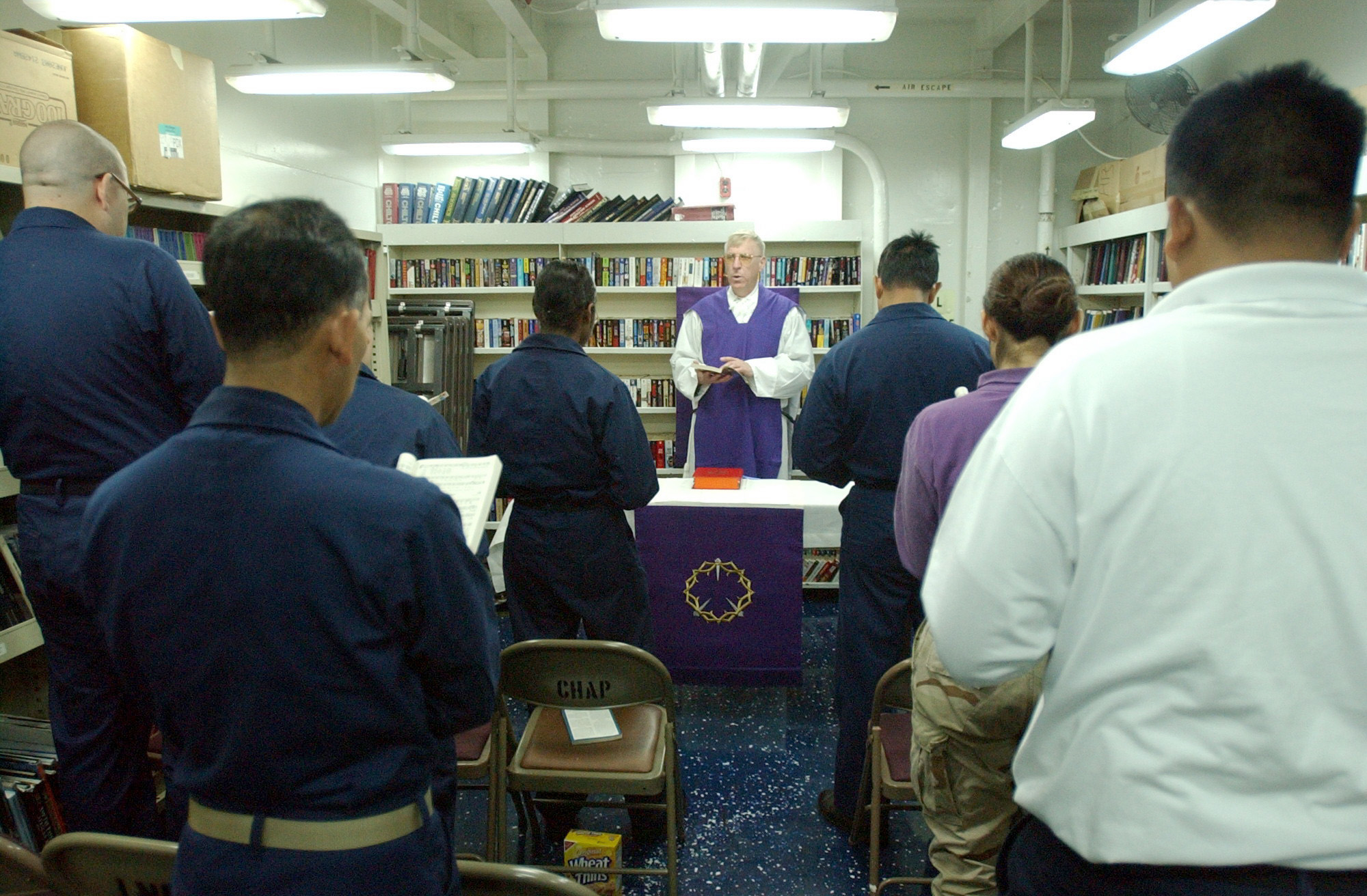 US Navy 030407-N-5555F-038 Cdr. Jerome Dillon, U.S. Navy chaplain from South Sioux City, Neb., conducts Roman Catholic Mass aboard the fast combat support ship USS Sacramento (AOE 1