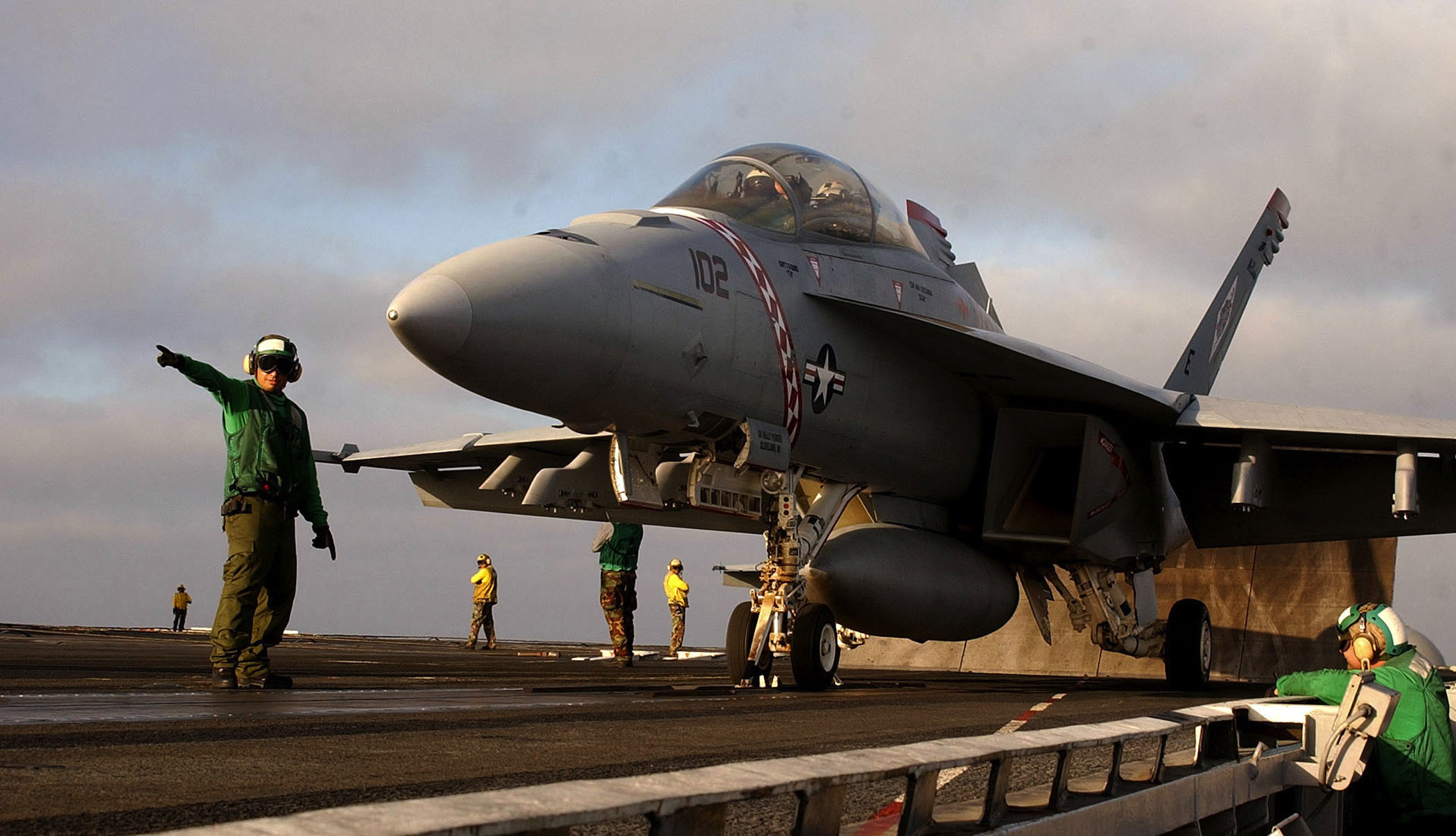 US Navy 030807-N-7732W-022 Flight deck personnel stand by to launch an F-A-18F Super Hornet 
