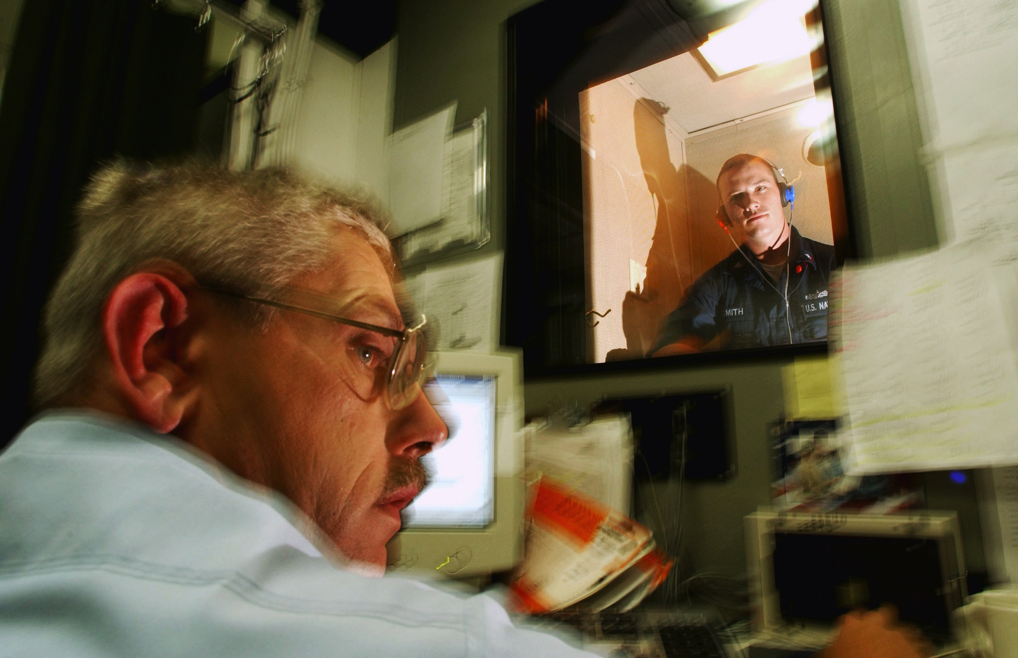 US Navy 030924-N-9769P-019 administers a hearing test 
