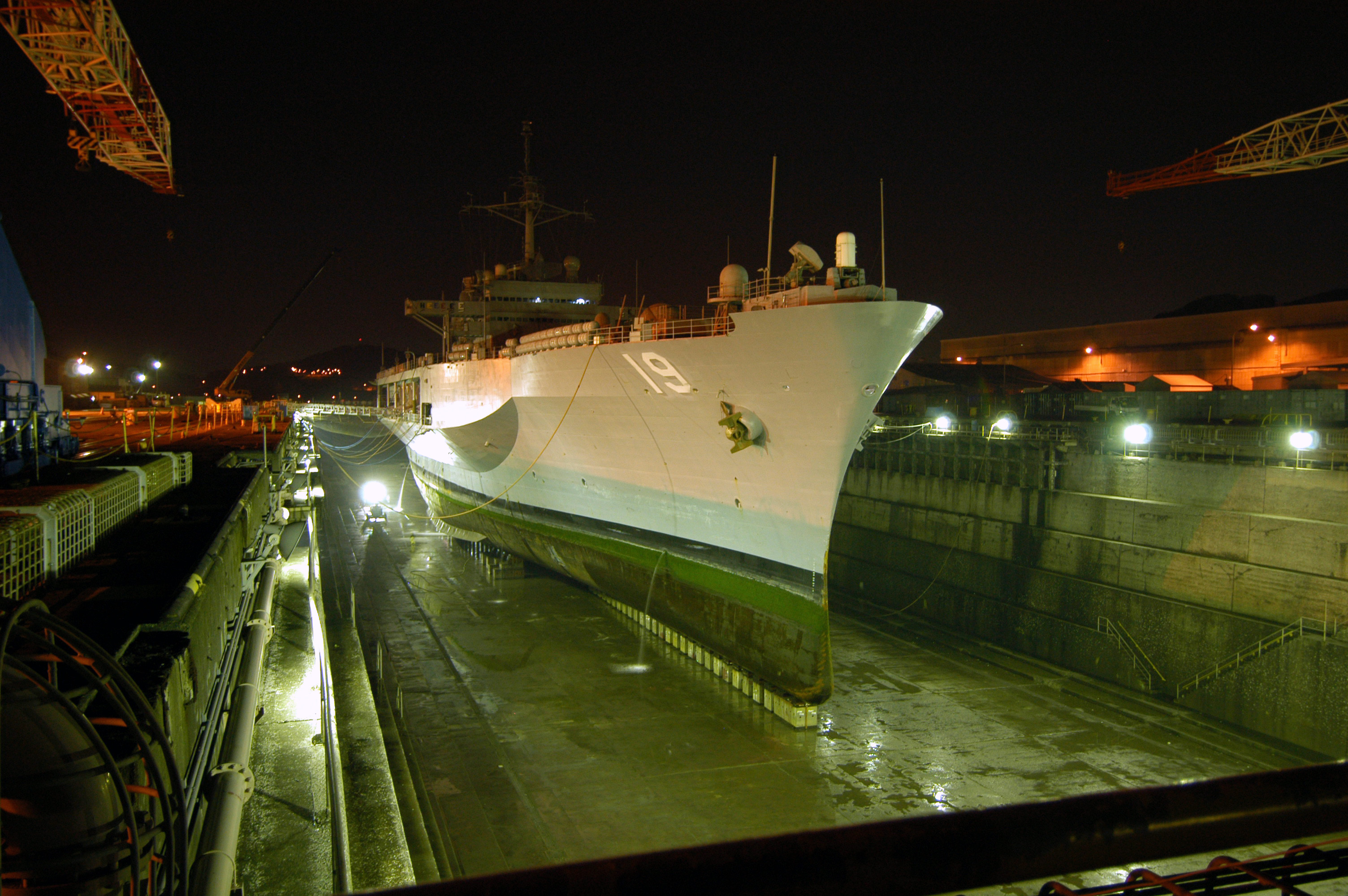 US Navy 040412-N-8955H-153 USS Blue Ridge rests in the Naval Ship Repair Facility dry dock located in Yokosuka, Japan