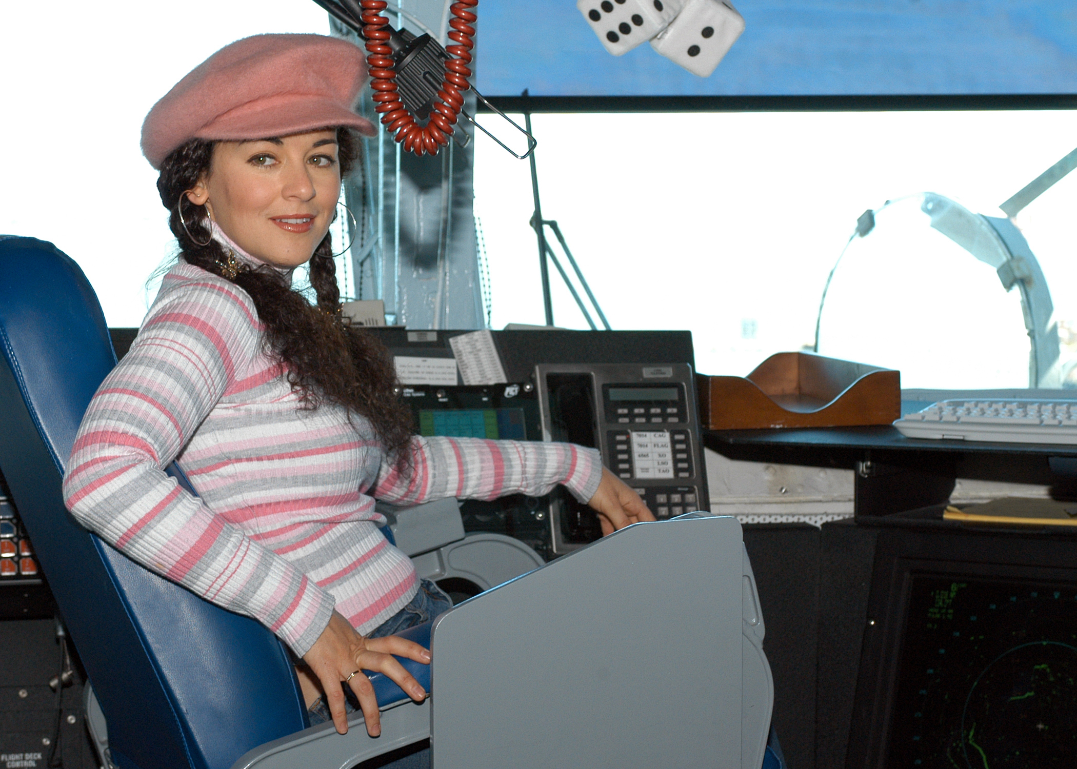 US Navy 040416-N-0119G-001 Country music entertainer Sherrie Austin sits in the Captain's chair on the bridge aboard the nuclear powered aircraft carrier USS Enterprise (CVN 65)