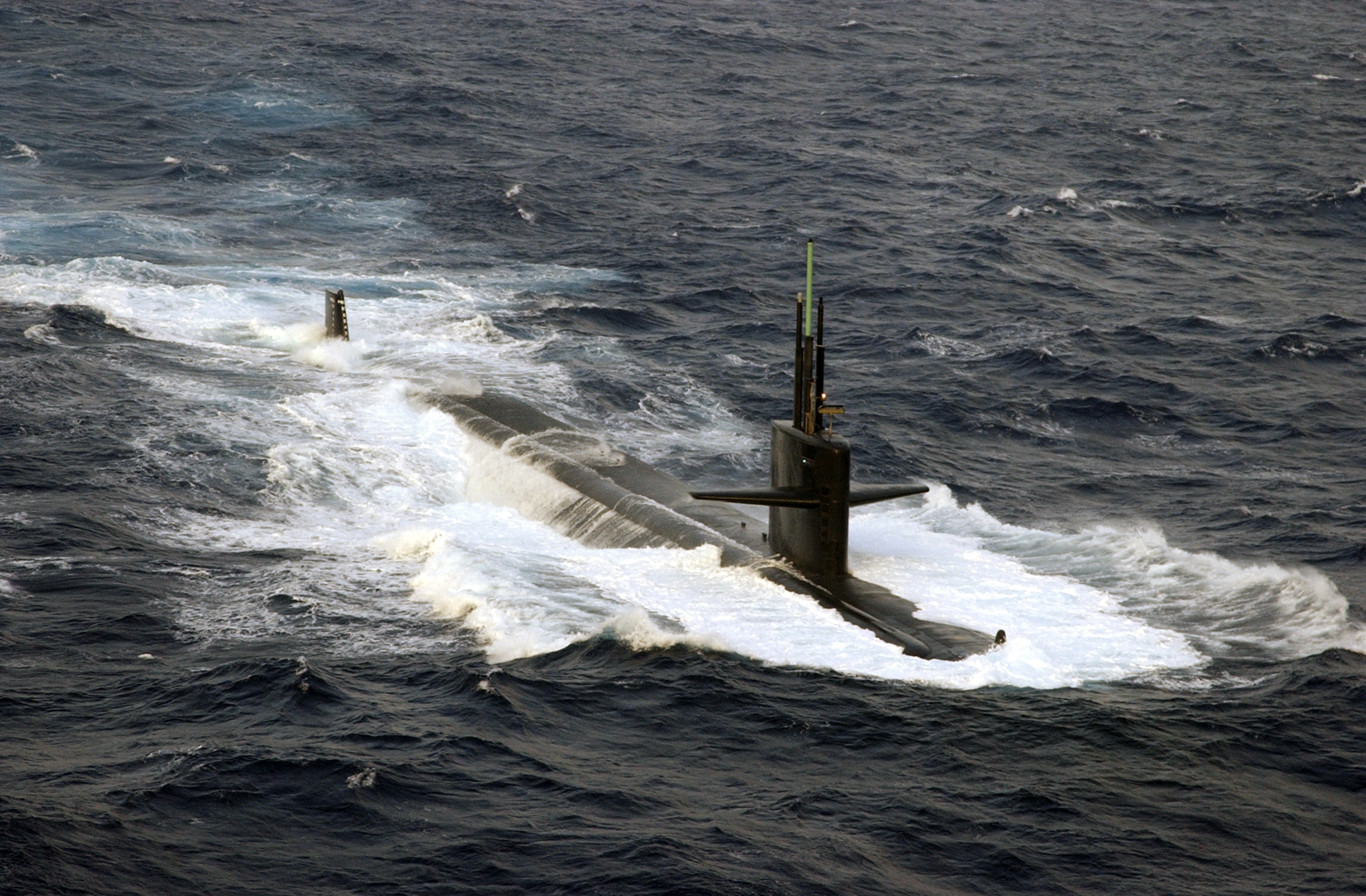 US Navy 040712-N-7748K-004 The Los Angeles-class submarine USS Albuquerque (SSN 706) surfaces in the Atlantic Ocean while participating in Majestic Eagle 2004