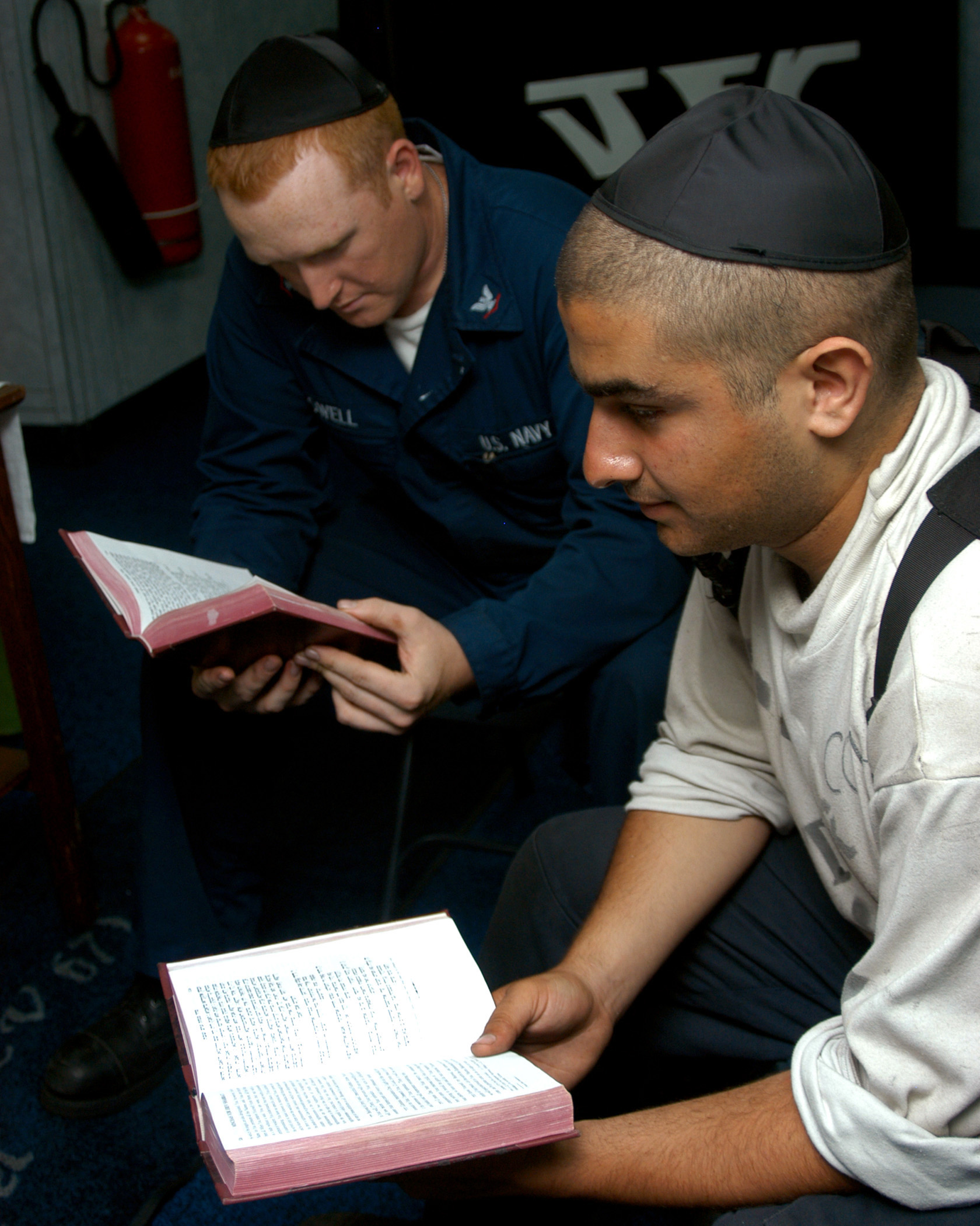 US Navy 040724-N-7683J-001 Aviation Electronic Technician Etan Cohen leads a Jewish prayer service in the ship^rsquo,s chapel aboard USS John F. Kennedy (CV 67)