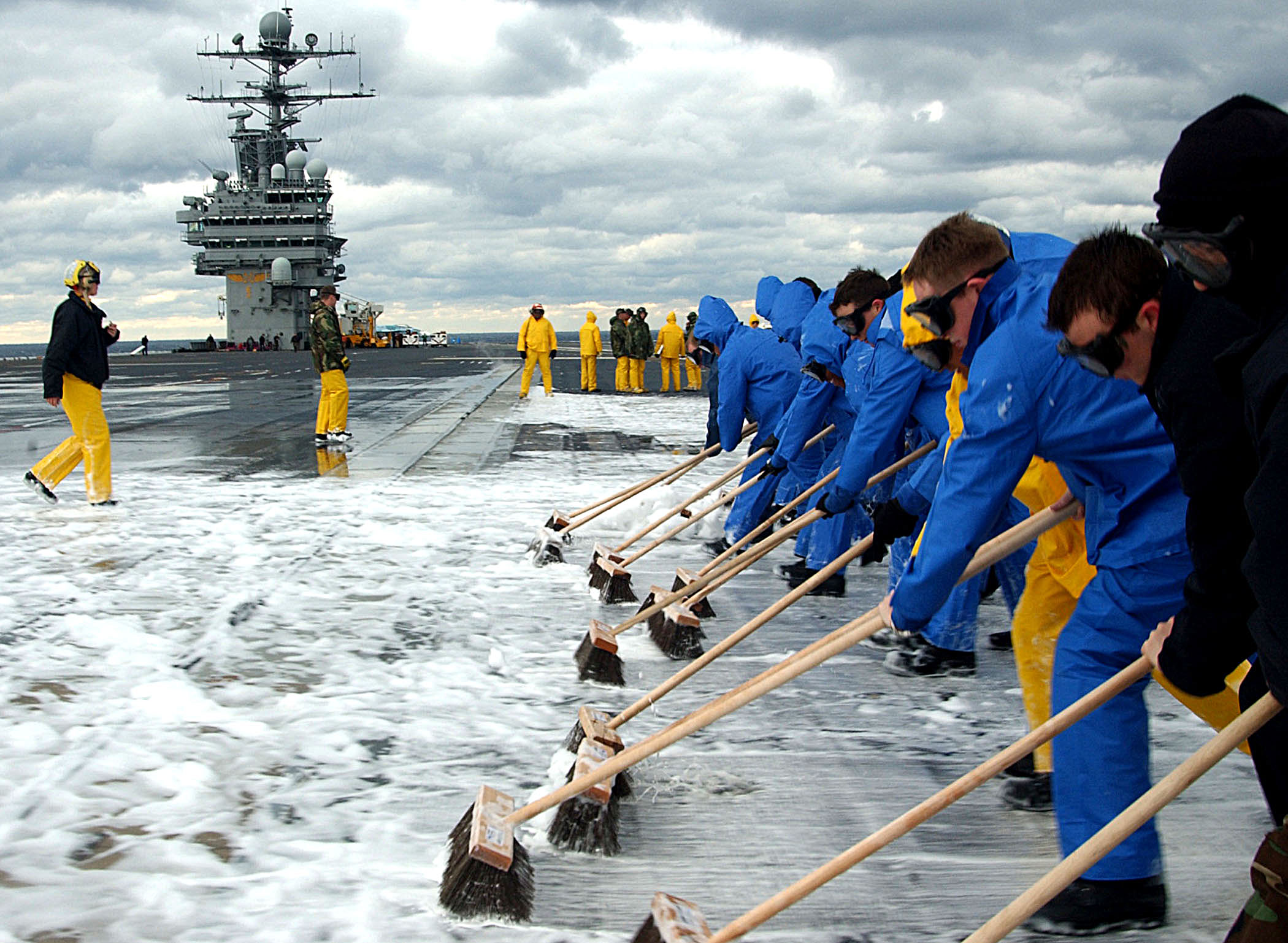 US Navy 041212-N-2838C-003 Sailors assigned to Air Department conduct a Scrub Exercise (SCRUBEX) on the flight deck aboard the Nimitz-class aircraft carrier USS Theodore Roosevelt (CVN 71)