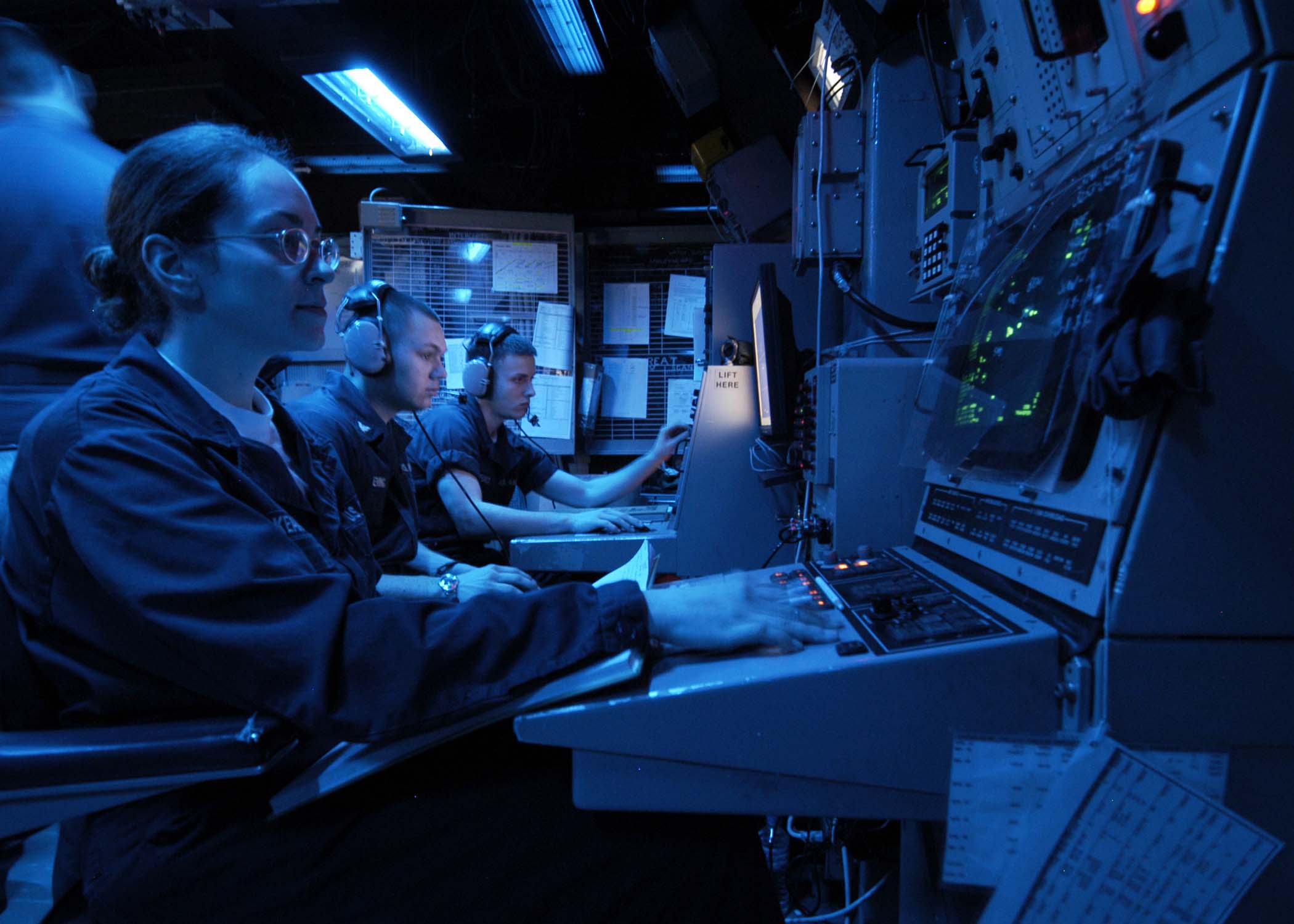 US Navy 050215-N-1229B-050 Cryptologic Technician Technical Seaman Annette Mckean monitors a radar screen during her watch aboard the Nimitz-class aircraft carrier USS Abraham Lincoln (CVN 72)