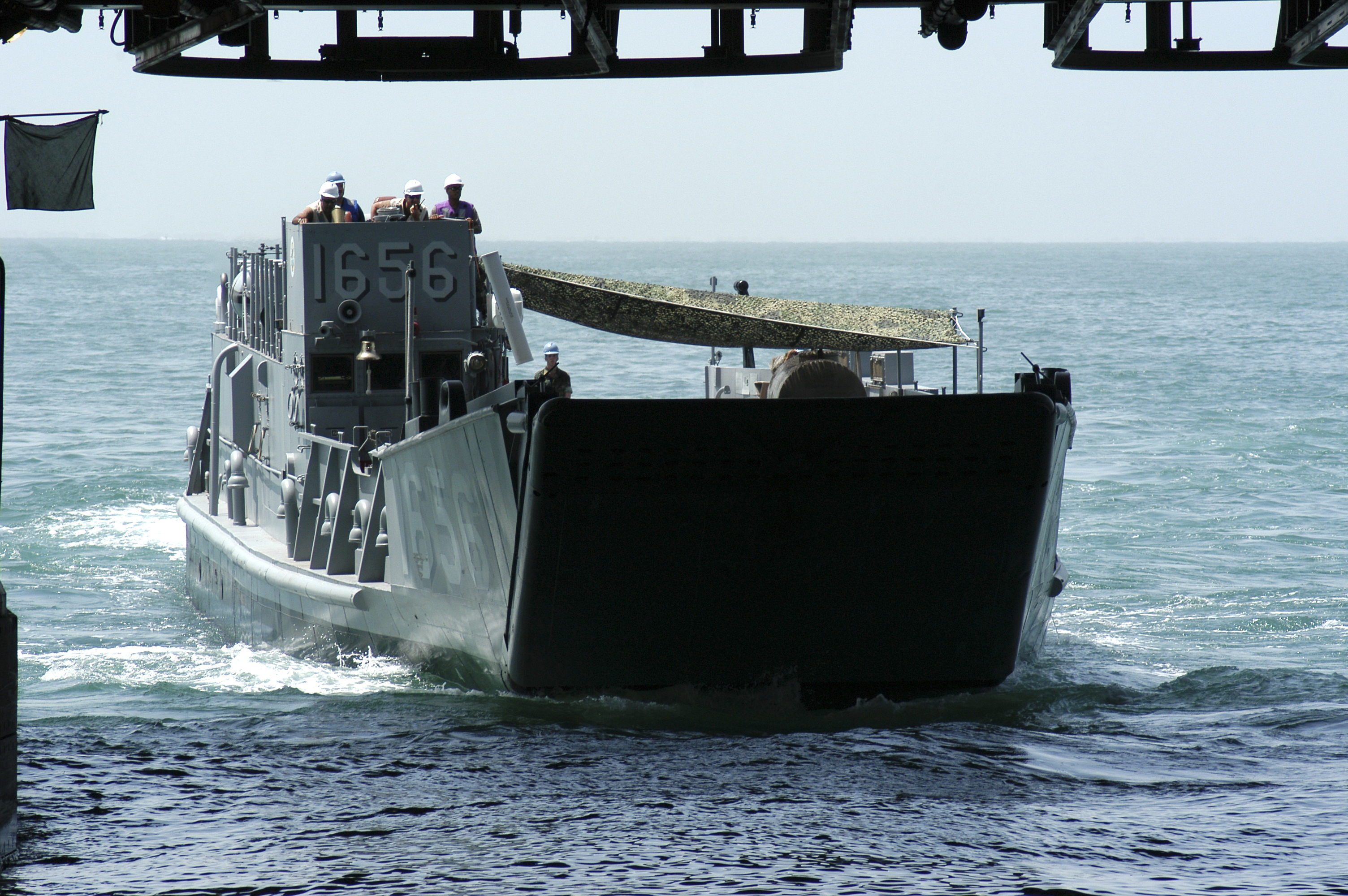 US Navy 050729-N-8154G-080 A Landing Craft, Utility, assigned to Assault Craft Unit Two (ACU-2), prepares to enter the well deck of the amphibious assault ship USS Bataan (LHD 5)