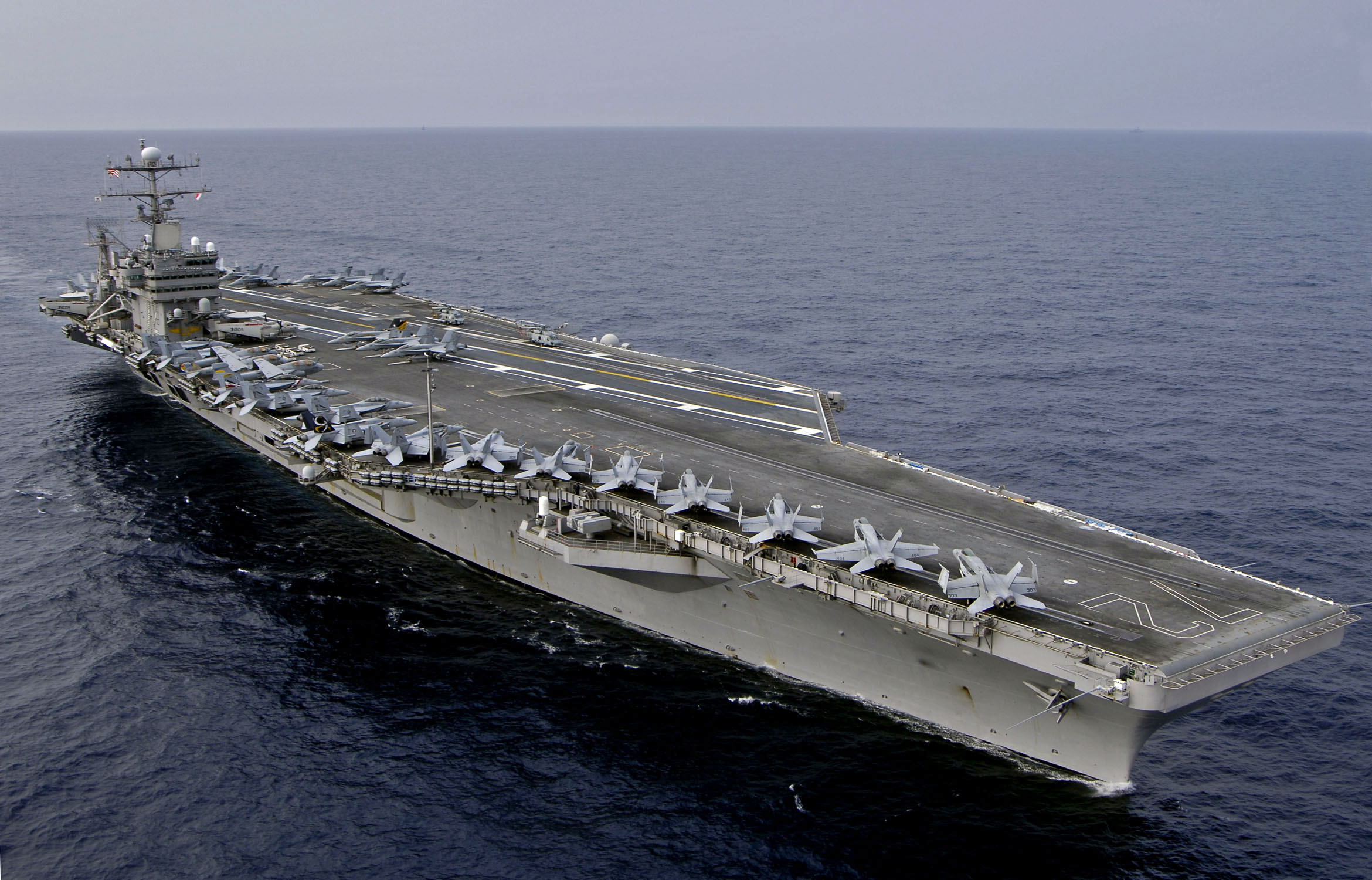 US Navy 060323-N-6074Y-177 The Nimitz-class aircraft carrier USS Abraham Lincoln (CVN-72), and ships of the Japanese Maritime Self-Defense Force (JMSDF) conduct a PASSEX in the Western Pacific