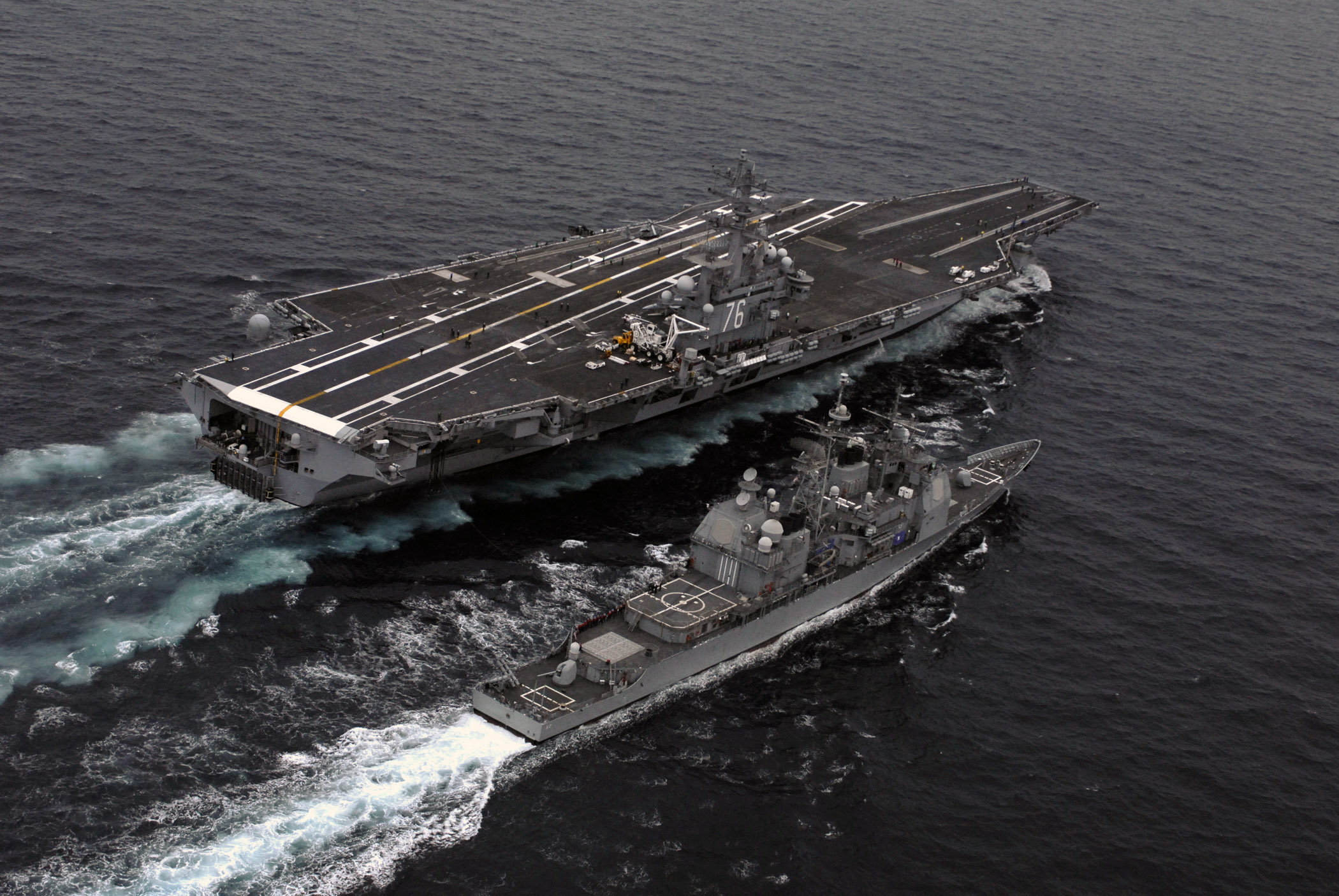 US Navy 071106-N-4776G-138 Nimitz-class aircraft carrier USS Ronald Reagan (CVN 76) conducts a fueling at sea (FAS) with guided-missile cruiser USS Chancellorsville (CG 62)