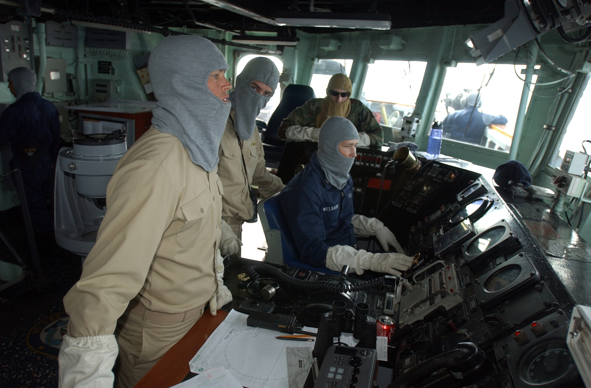 US Navy 080628-N-8943B-036 ns. Adam Berry and Lt.j.g. Douglas Nelson stand watch on the bridge of the guided-missile frigate USS Simpson (FFG 56)