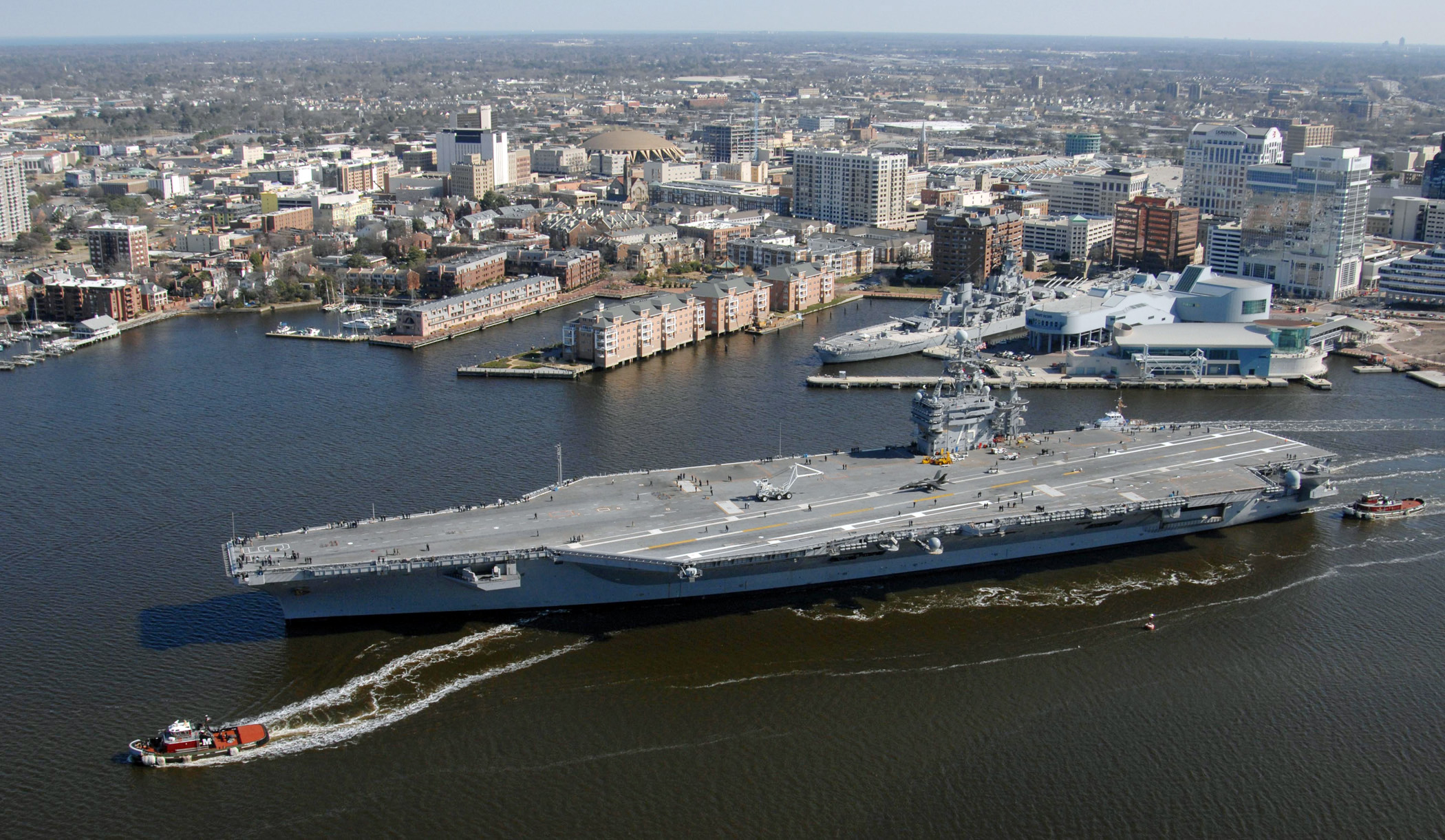 US Navy 090213-N-3673F-002 The Nimitz-class aircraft carrier USS Harry S. Truman (CVN 75) transits up the Elizabeth River as it passes the downtown Norfolk waterfront