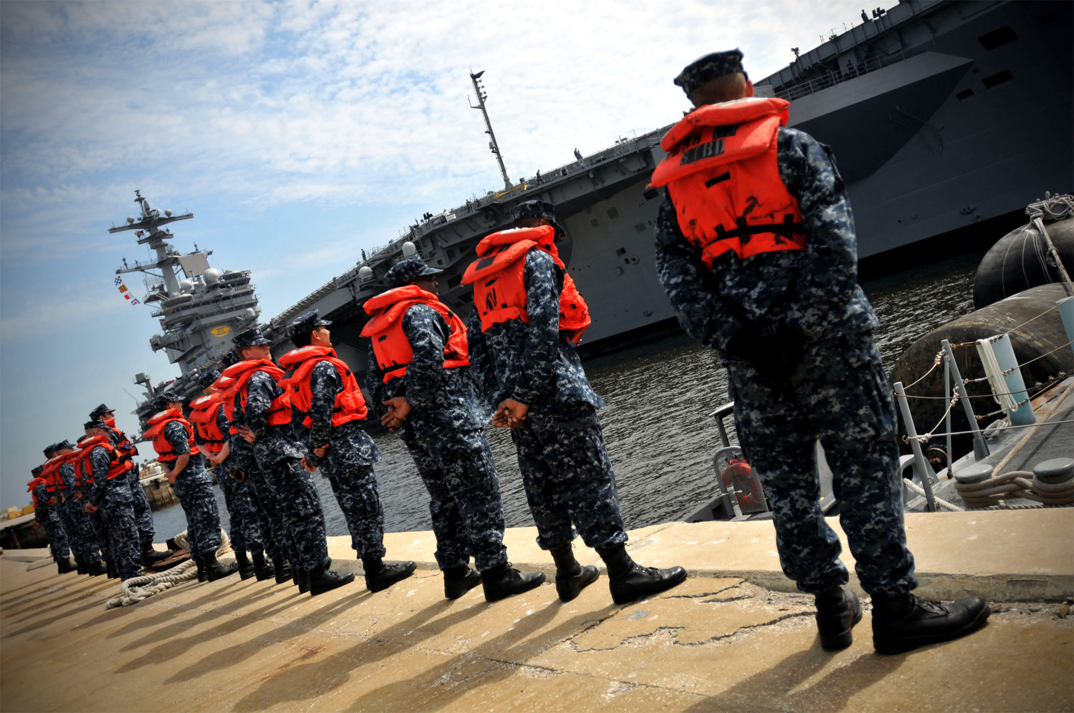 US Navy 100310-N-8590G-005 Sailors stand by for line handling as USS George H.W. Bush (CVN 77) approaches the pier at Naval Station Mayport