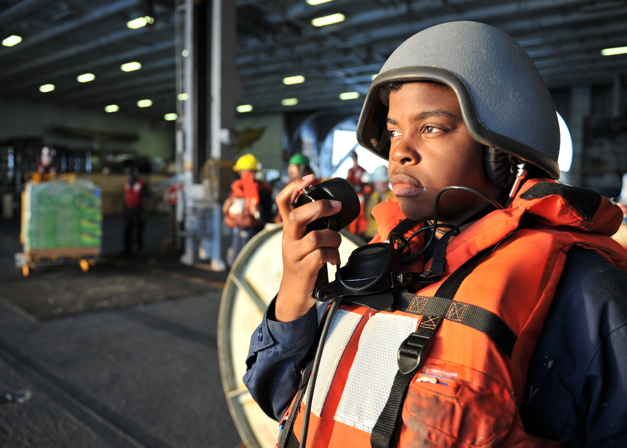 US Navy 101216-N-5016P-061 Seaman Diana Crowder mans a sound-powered phone during a replenishment at sea aboard the aircraft carrier USS Abraham Li