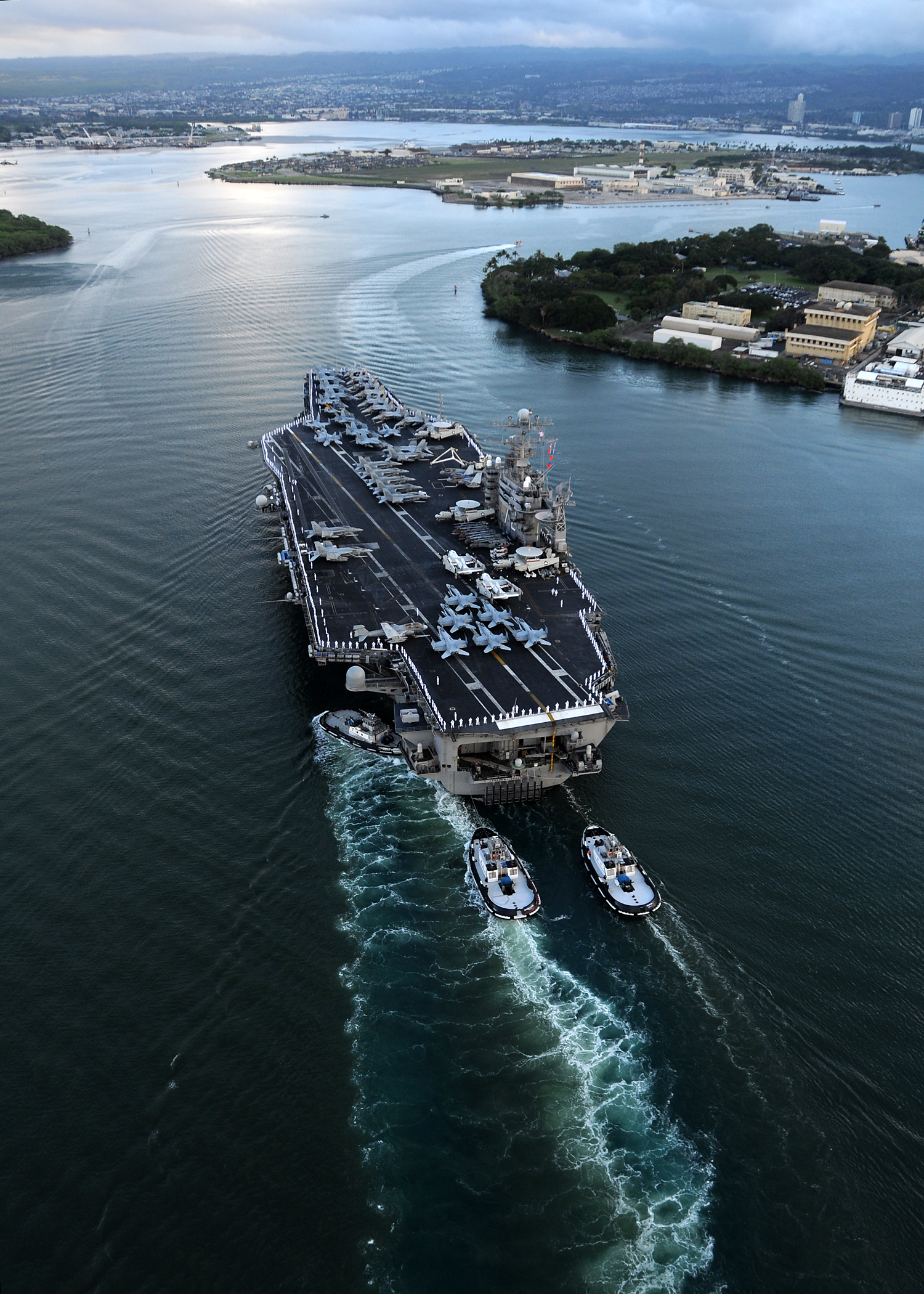 US Navy 110310-N-CQ682-278 The aircraft carrier USS Abraham Lincoln (CVN 72) arrives in Pearl Harbor for a port visit