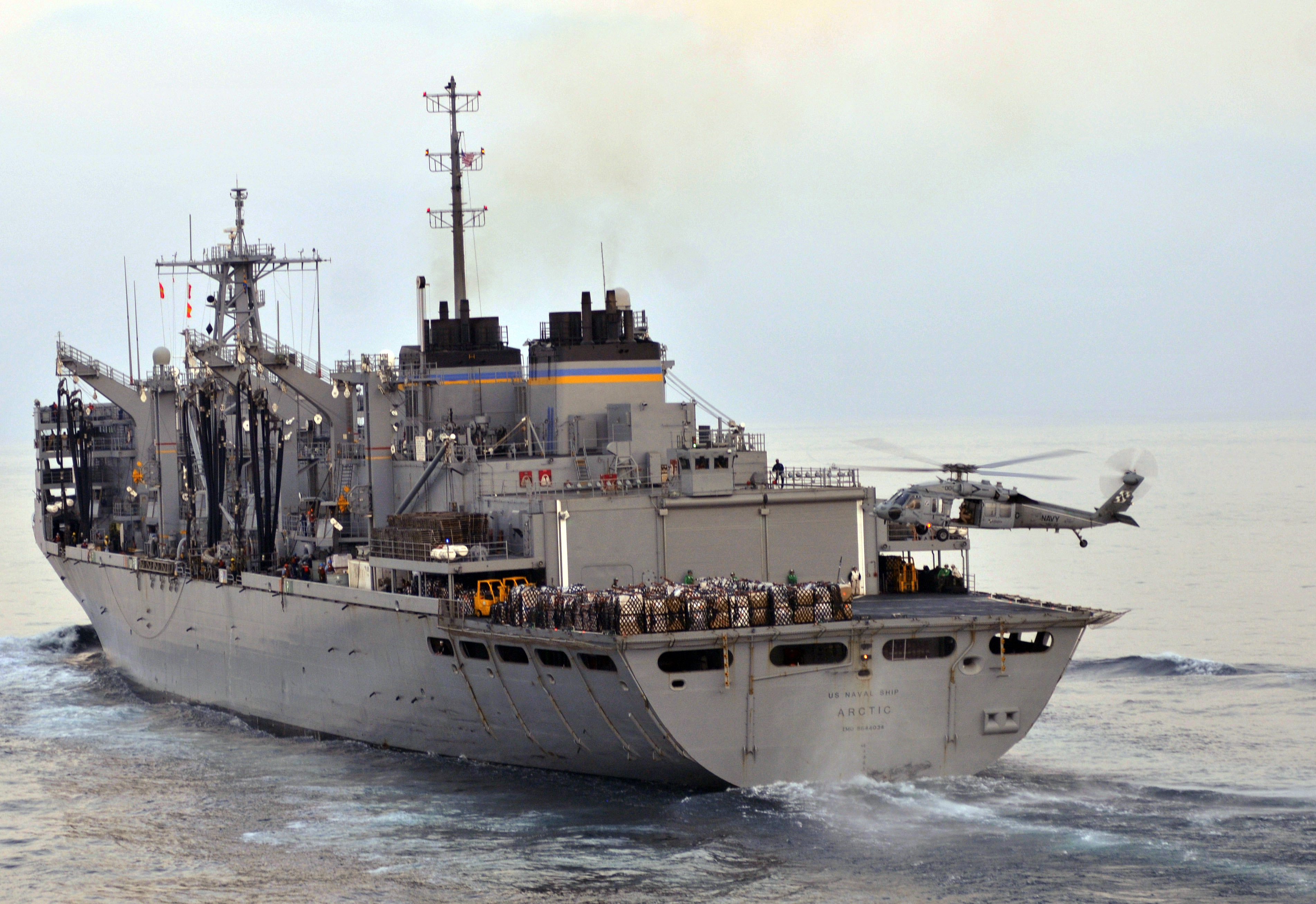 US Navy 110323-N-3852A-029 USNS Arctic (T-AOE 8) approaches SS Enterprise (CVN 65) during an underway replenishment